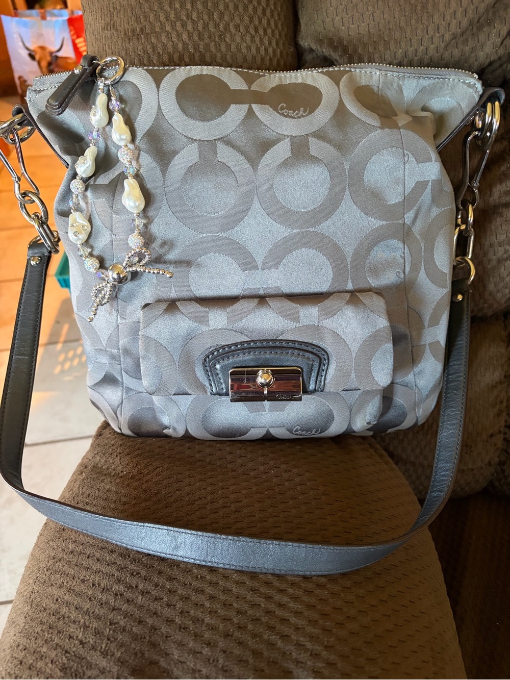 Gorgeous Coach Kristin Op Art Sateen Hobo bag in a gray or silver colorway